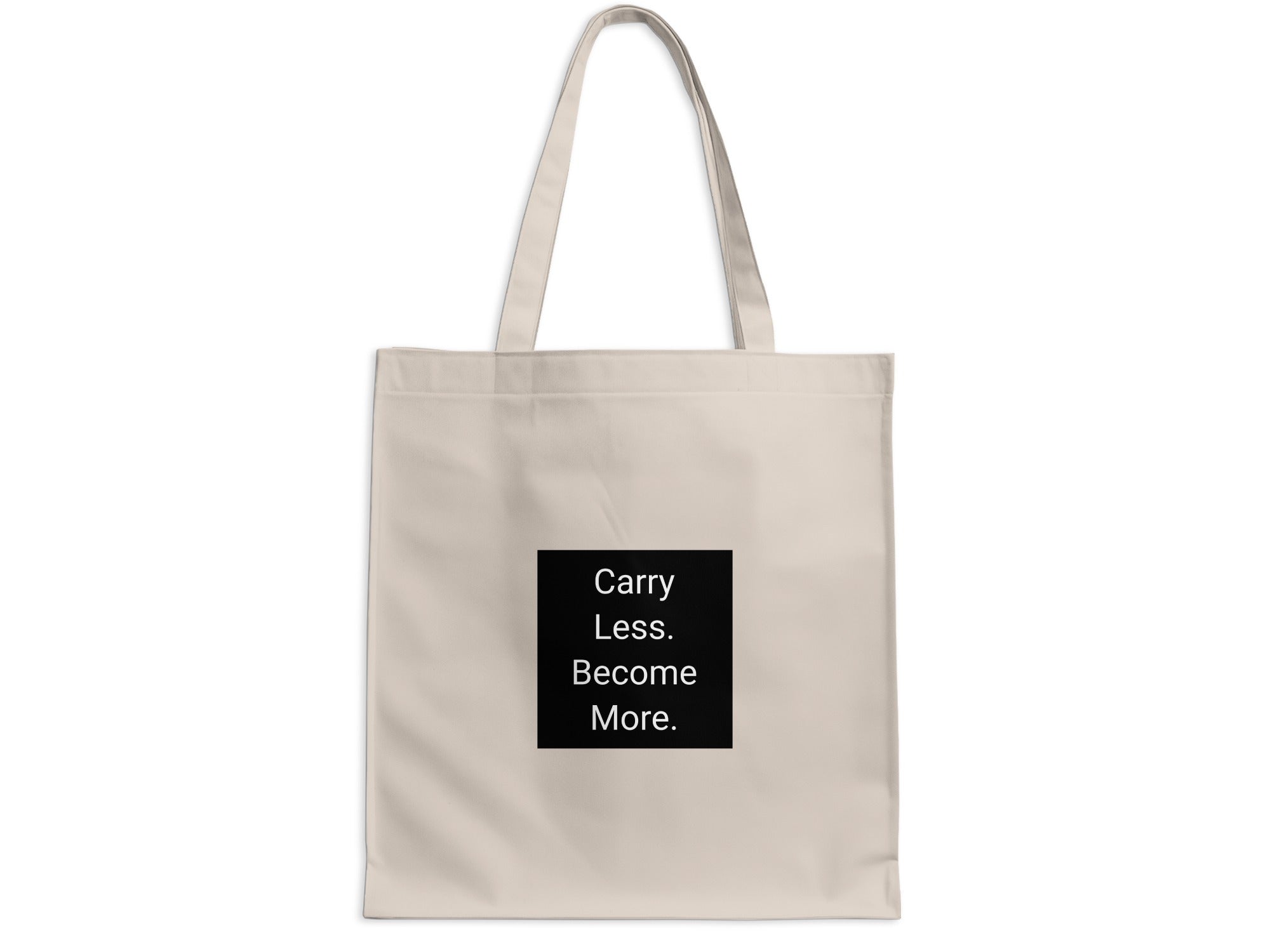 Beige tote bag with black square featuring white text: Carry Less. Become More.